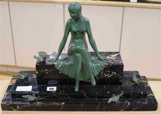 A French bronze of a woman and doves, on a marble base height 32cm